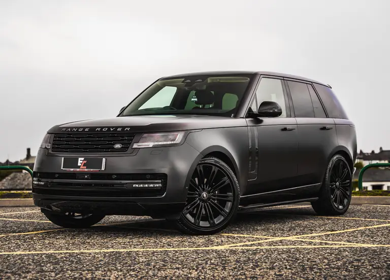 Range Rover + £5,000 Cash