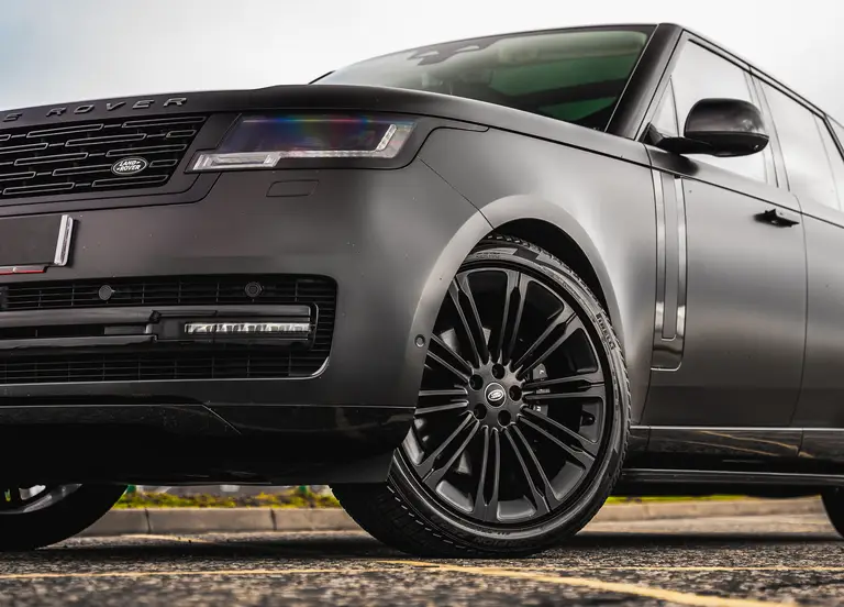 Range Rover + £5,000 Cash